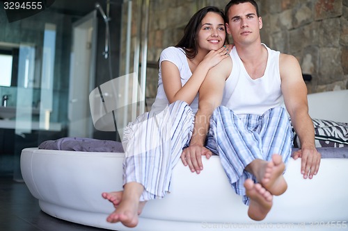 Image of couple relax and have fun in bed