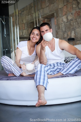 Image of couple relax and have fun in bed