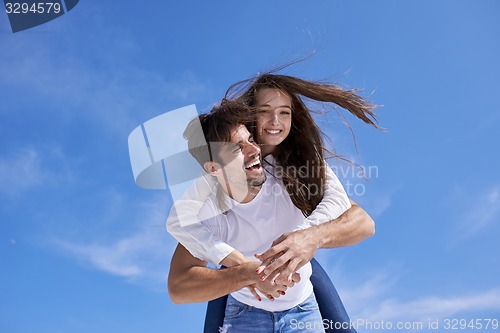 Image of happy young romantic couple have fun arelax  relax at home