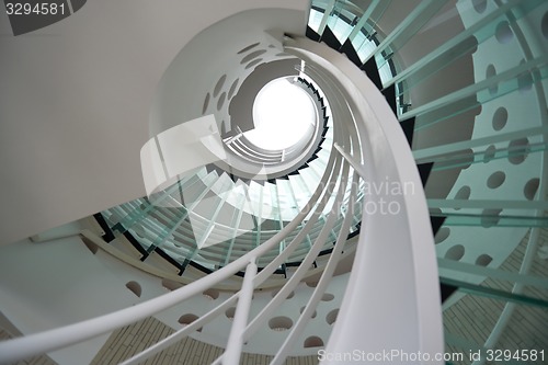 Image of modern glass spiral staircase