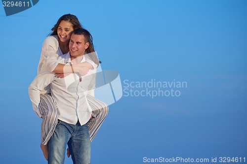 Image of happy young romantic couple have fun arelax  relax at home