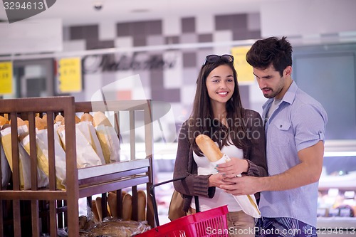 Image of couple shopping in a supermarket