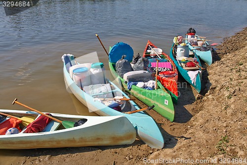 Image of Canoes on the Riverside