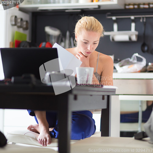 Image of Female freelancer working from home.