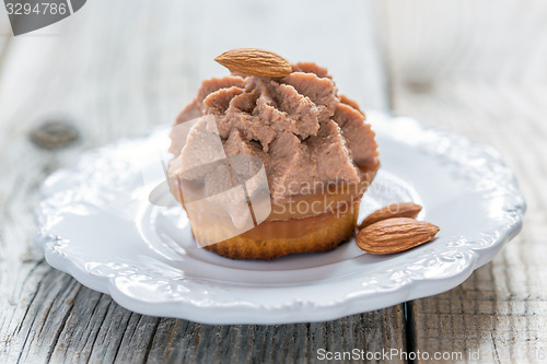 Image of Almond Cake with curd cream and caramel.