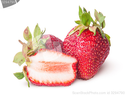 Image of Two freshly whole and half strawberries