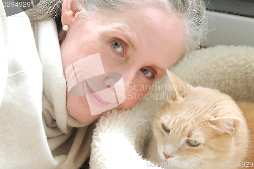 Image of Female and cat.