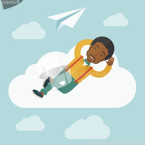 Image of Black man lying on a cloud with paper plane.