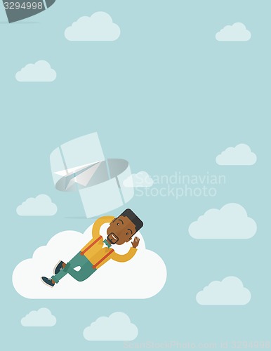 Image of Black man lying on a cloud with paper plane.