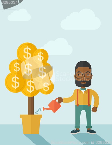 Image of African businessman happily watering the money tree.