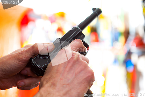 Image of Luger Parabellum automatic pistol in a hands