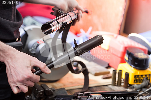 Image of restoration of the old German submachine gun MP-38