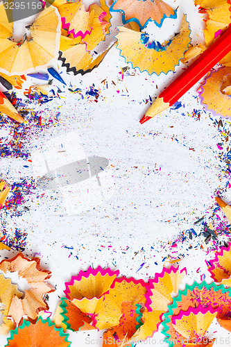 Image of multicolored pencil shavings and copy space