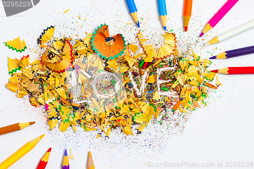 Image of The word LOVE on the background from pencil shavings