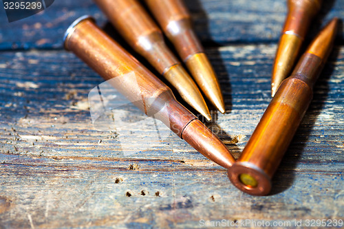 Image of Still life with five rifle cartridges