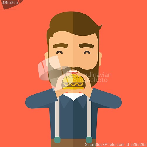Image of Man happy eating hamburger.