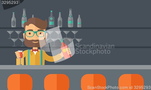 Image of Bartender at the bar holding a drinks.