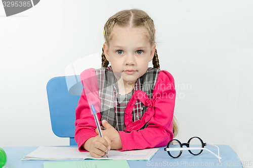 Image of First grader do homework