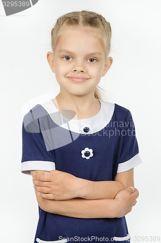 Image of Half-length portrait of positive six-year girl