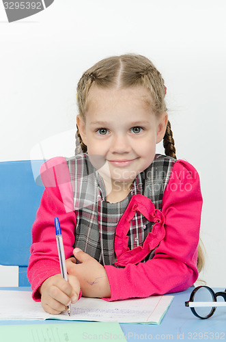 Image of Schoolgirl do homework