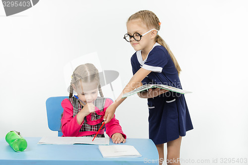 Image of Girl student teacher shows an error