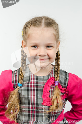 Image of Half-length portrait positive four-year girl