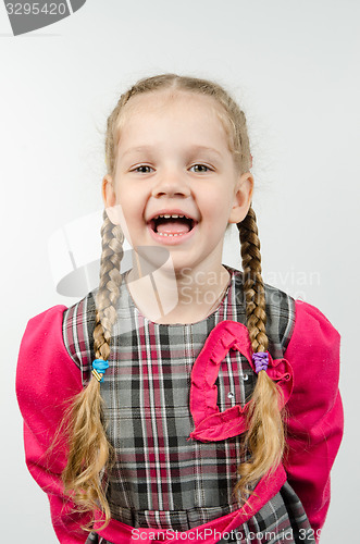 Image of Half-length portrait of a smiling girl four years