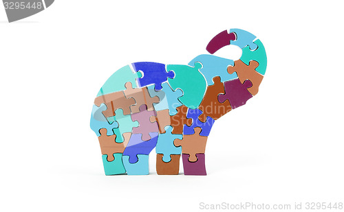 Image of Colorful puzzle pieces in elephant shape