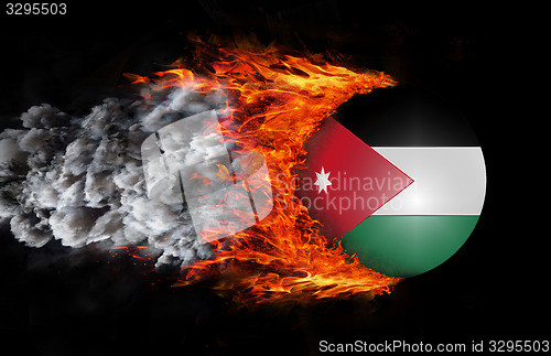 Image of Flag with a trail of fire and smoke - Jordan