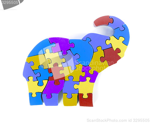 Image of Colorful puzzle pieces in elephant shape