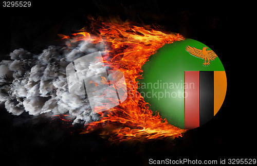 Image of Flag with a trail of fire and smoke - Zambia