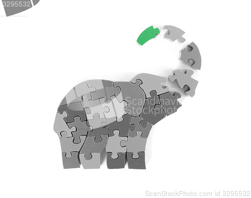 Image of Colorful puzzle pieces in elephant shape