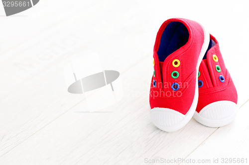 Image of red baby shoes