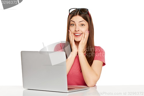 Image of Surprised girl with laptop