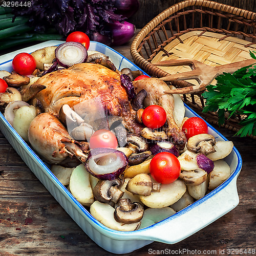 Image of delicious chicken baked potato and fresh vegetables