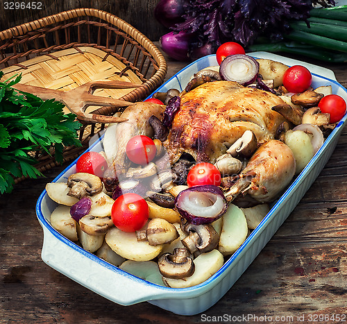 Image of delicious chicken baked potato and fresh vegetables