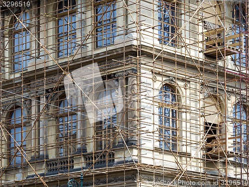 Image of Fragment of scaffolding against house wall in Prague