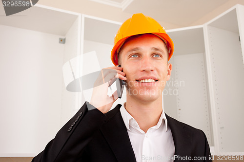 Image of engineer talking on the phone