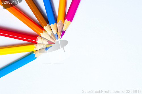 Image of colored pencils on white background