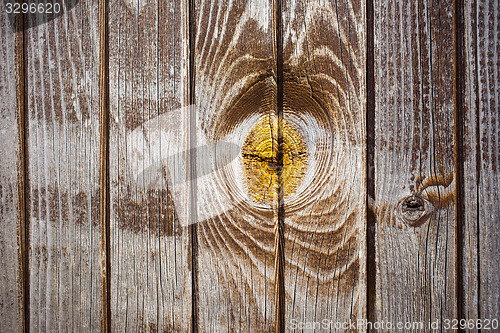 Image of aged boards with knot