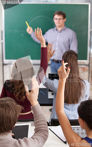 Image of colledge students in auditorium