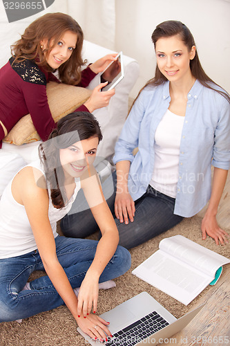 Image of Three girls and a laptop