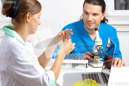 Image of scientists develop a new drug