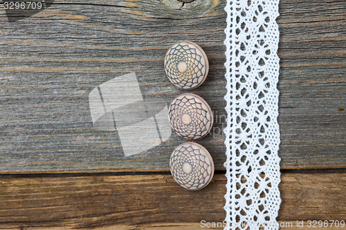 Image of set of three vintage buttons