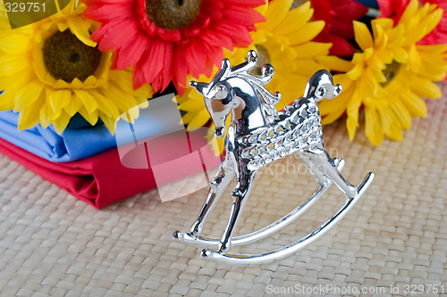 Image of silver rocking-horse