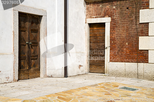 Image of  santo antonino  varese  the old door sunny daY