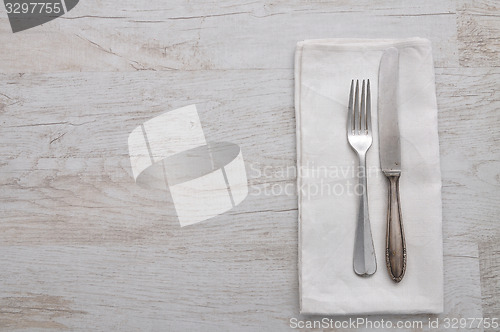 Image of Old cutlery on cloth