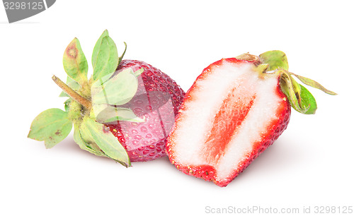 Image of One whole and half juicy strawberries