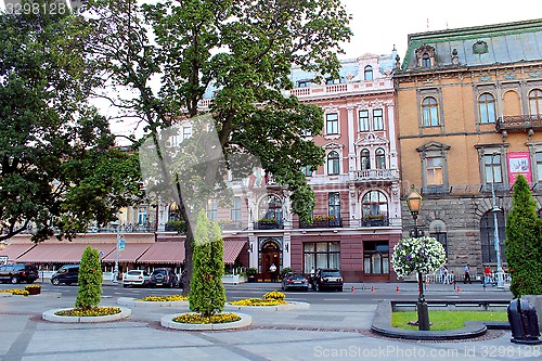 Image of street in Lviv with cozy caffe 