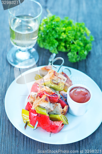 Image of fried kebab with sauce